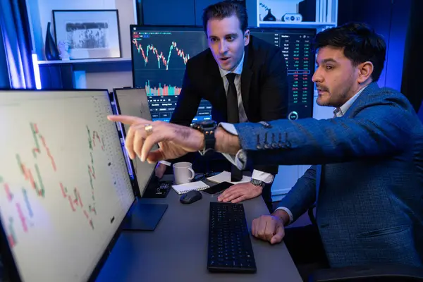 depositphotos_689697374-stock-photo-stock-exchange-traders-looking-high